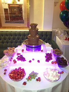 Mini Chocolate Fountains for hire from Delicious Fruits & Fountain with illuminated stand and dippers